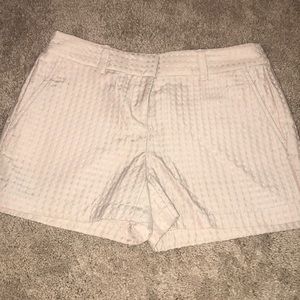 Tan shorts with pink polka dots